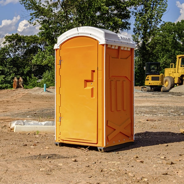 how often are the portable restrooms cleaned and serviced during a rental period in Holcombe